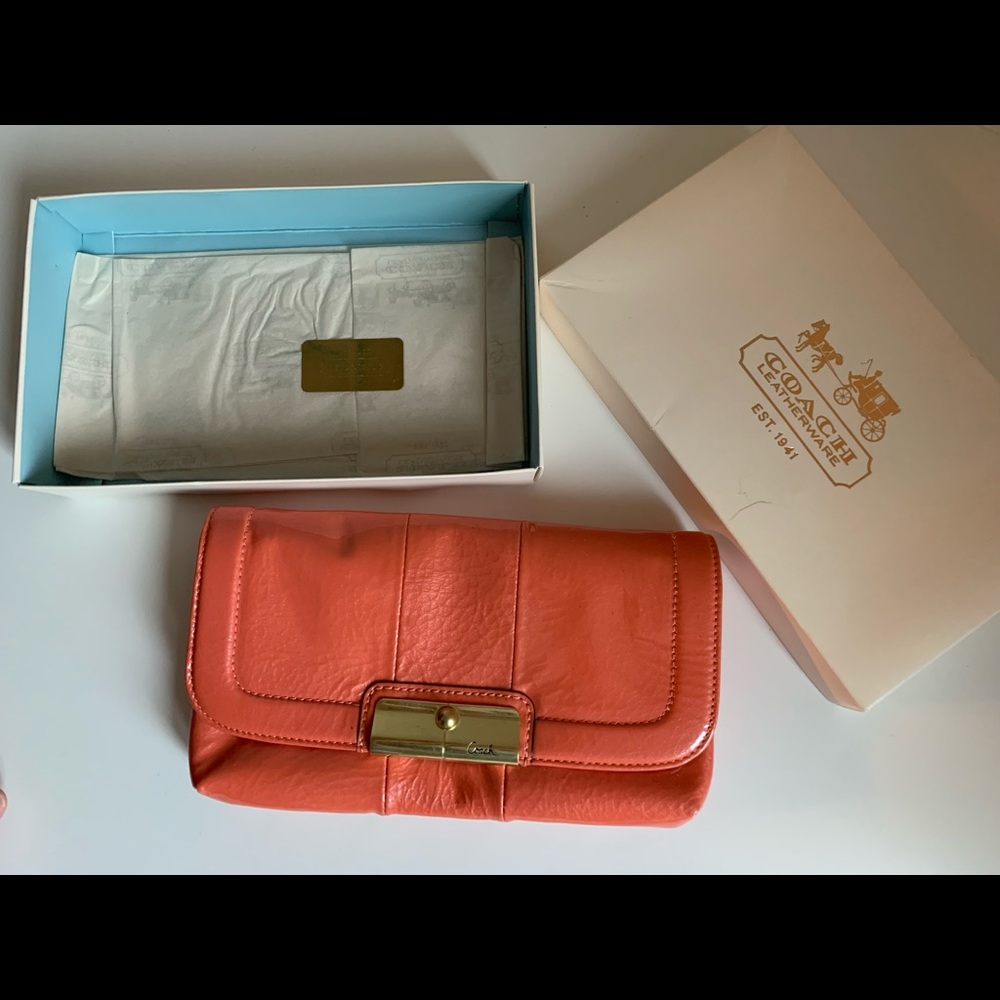 Coach patent leather coral wristlet
